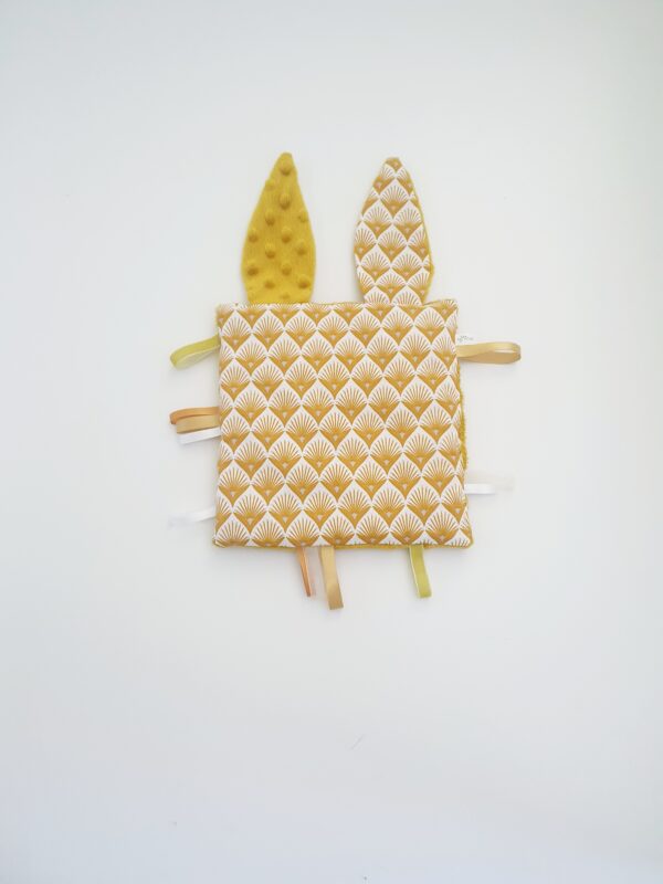 Doudou étiquettes paon jaune