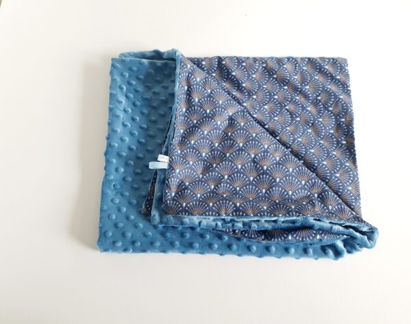 Couverture bleu paon